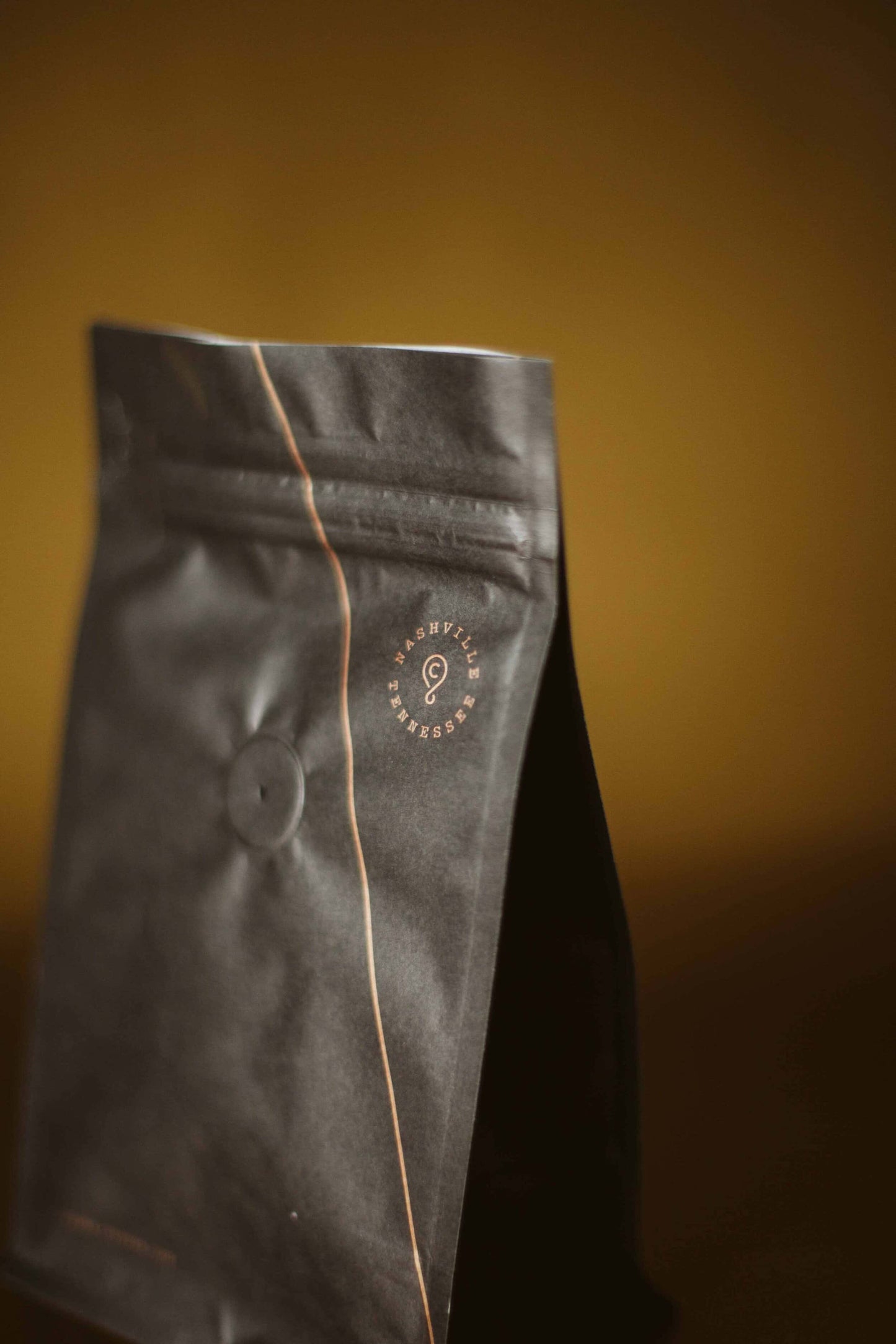 black compostable coffee bag from the side
