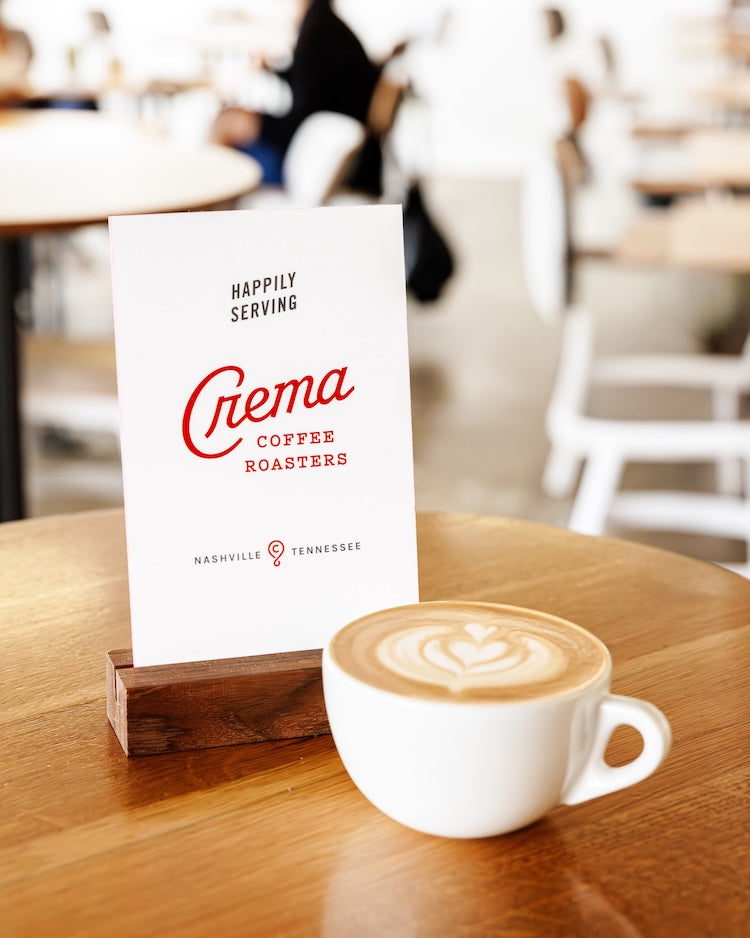 Happily Serving Crema Sign-1.jpg__PID:5786c409-5aa3-455f-8da9-dee68696ed0a